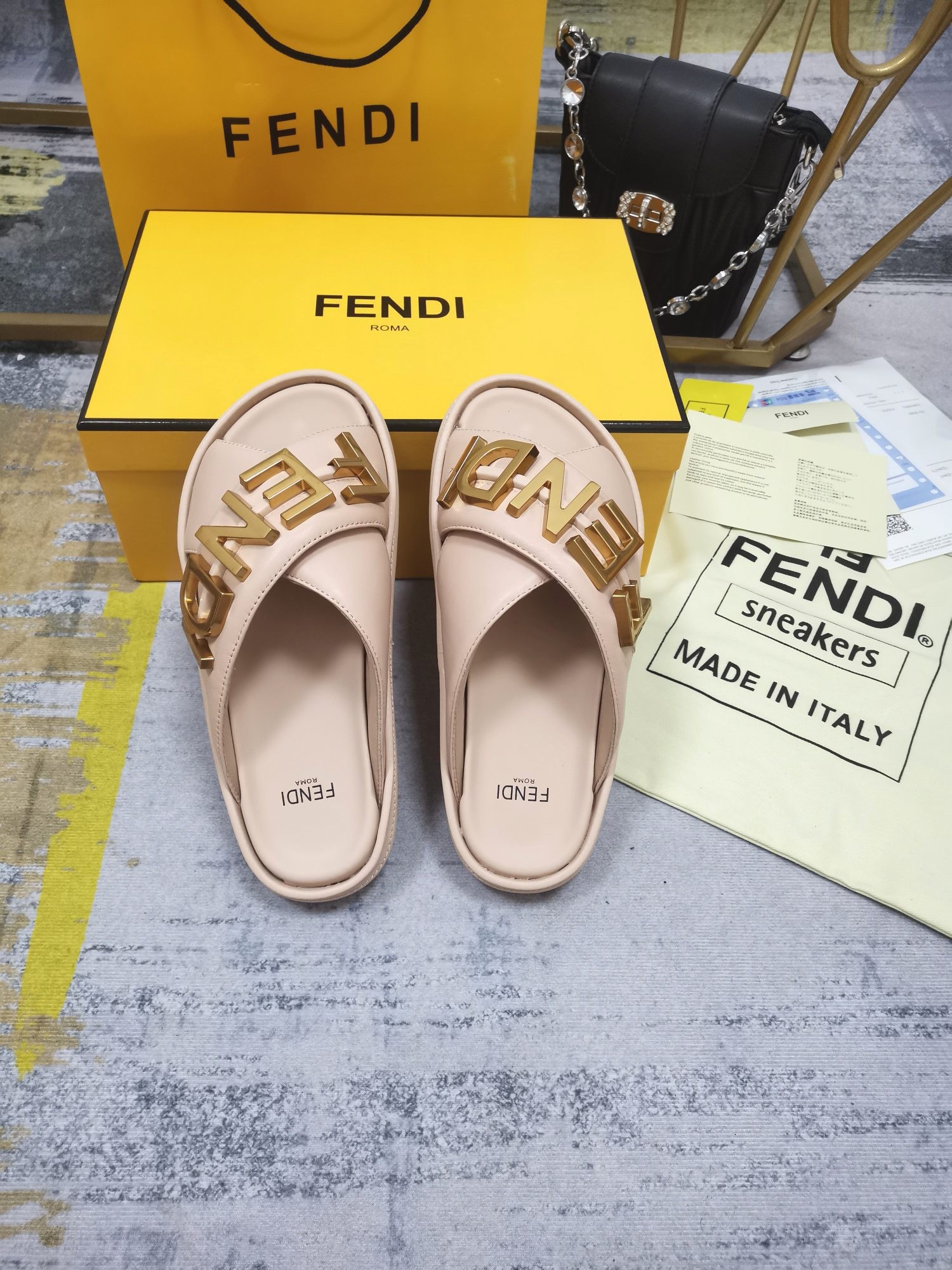 F**di F**digraphy slides in pink calfskin
