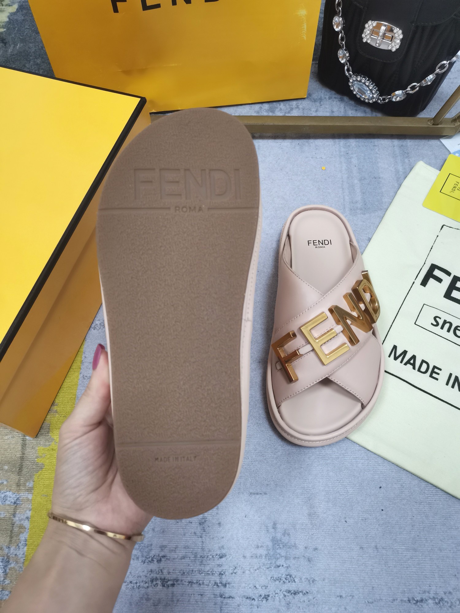 F**di F**digraphy slides in pink calfskin