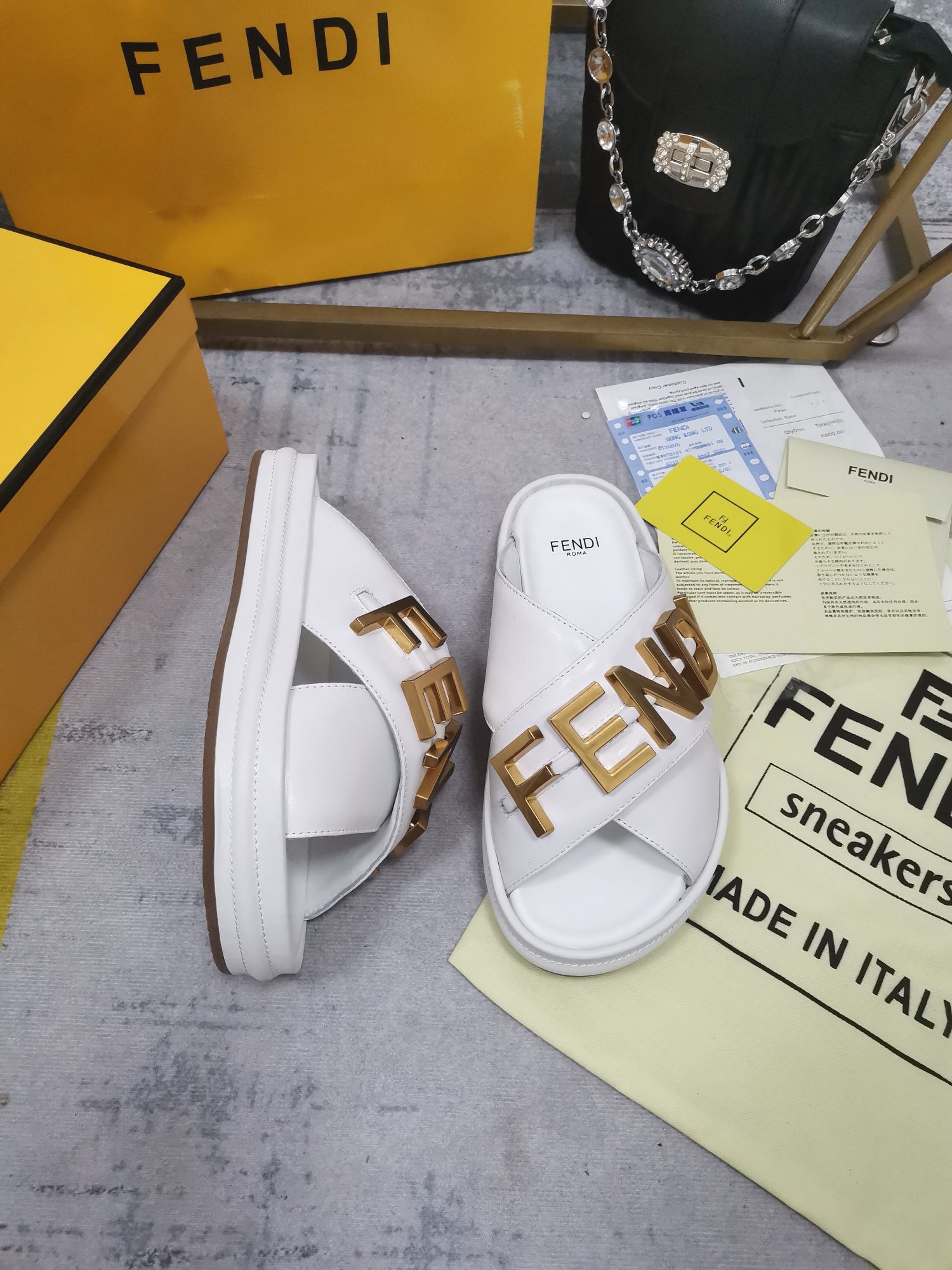 F**di F**digraphy slides in white calfskin