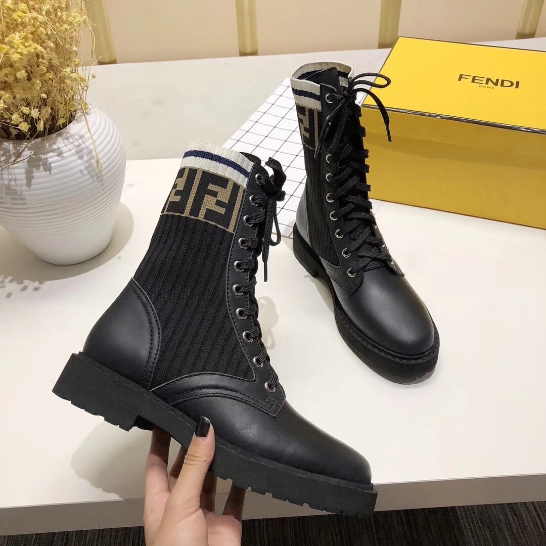 F**di ankle boots in black leather with stretch fabric