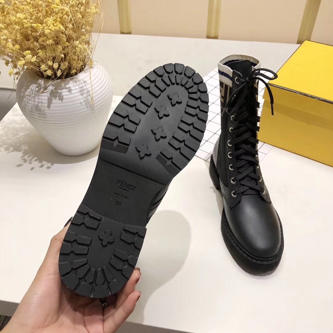 F**di ankle boots in black leather with stretch fabric