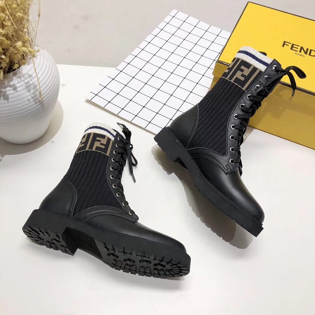 F**di ankle boots in black leather with stretch fabric