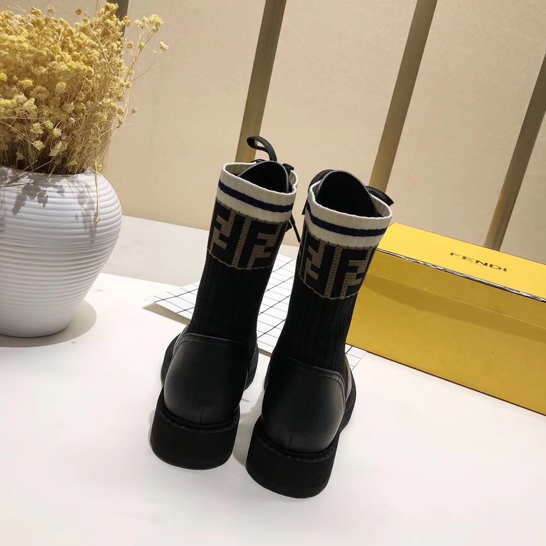 F**di ankle boots in black leather with stretch fabric