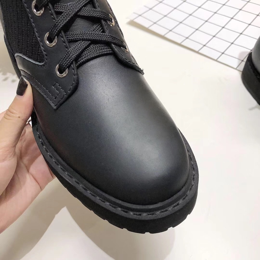 F**di ankle boots in black leather with stretch fabric