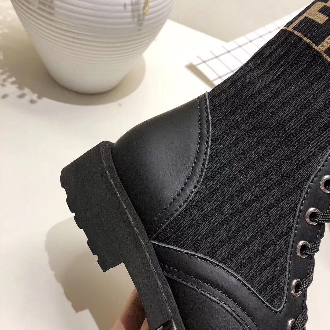 F**di ankle boots in black leather with stretch fabric