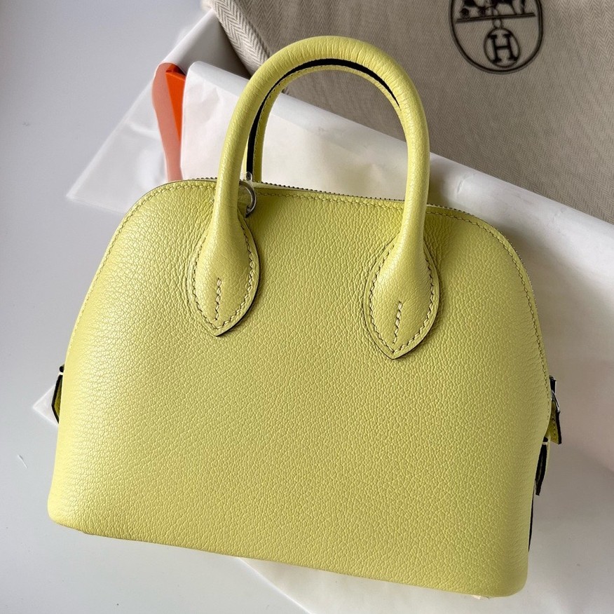 H**mes bolide 1923 mini handmade bag in jaune bourgeon chevre mysore leather
