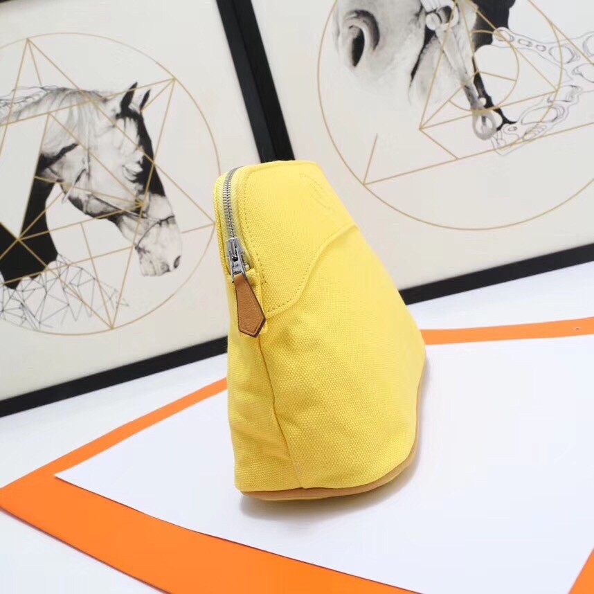 H**mes medium bolide travel case in yellow cotton