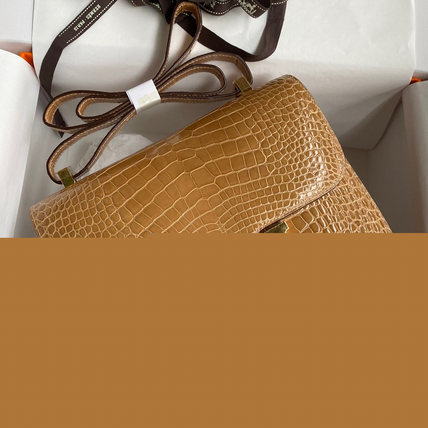 H**mes constance 24 handmade bag in beige shiny alligator leather