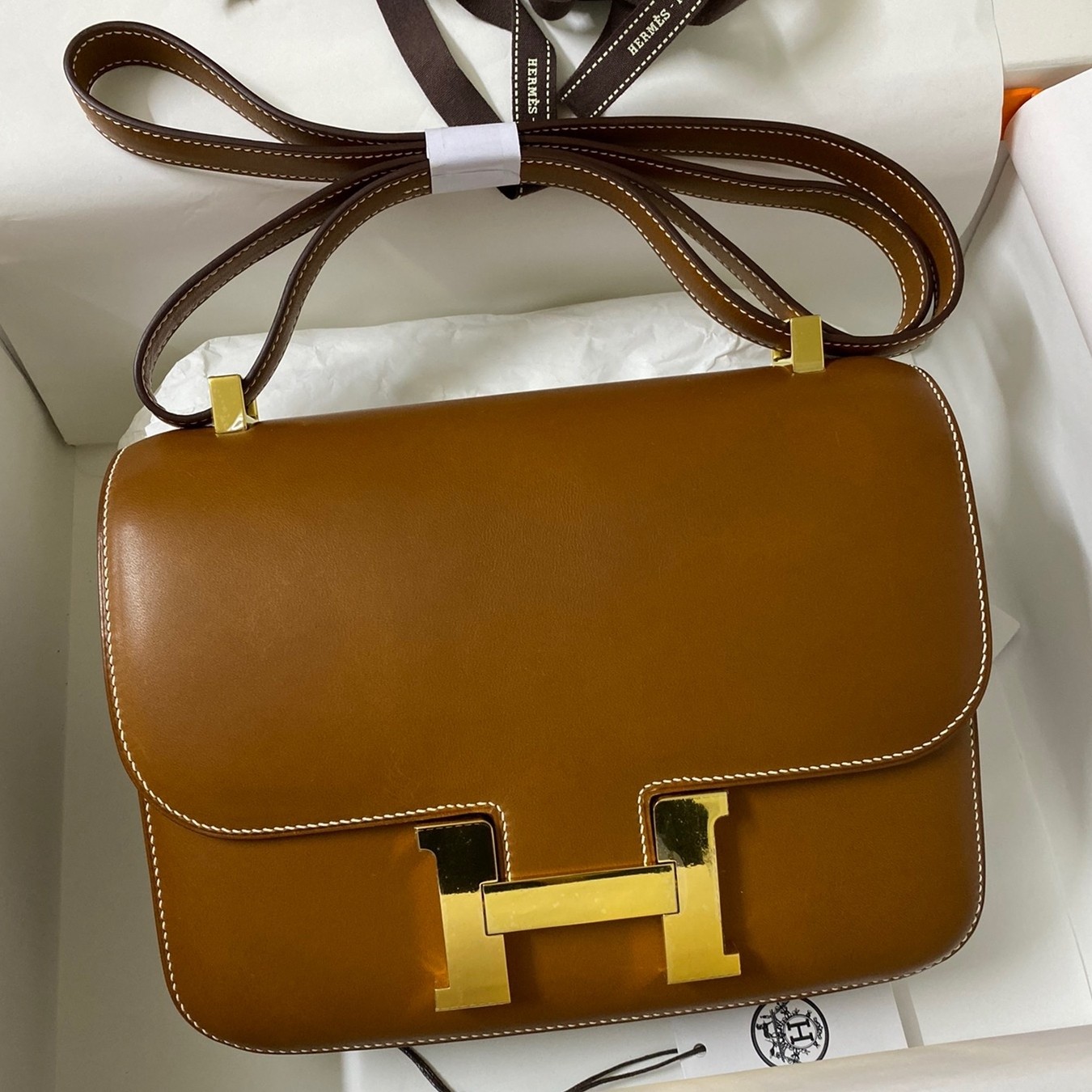 H**mes constance 24 handmade bag in gold barenia calfskin