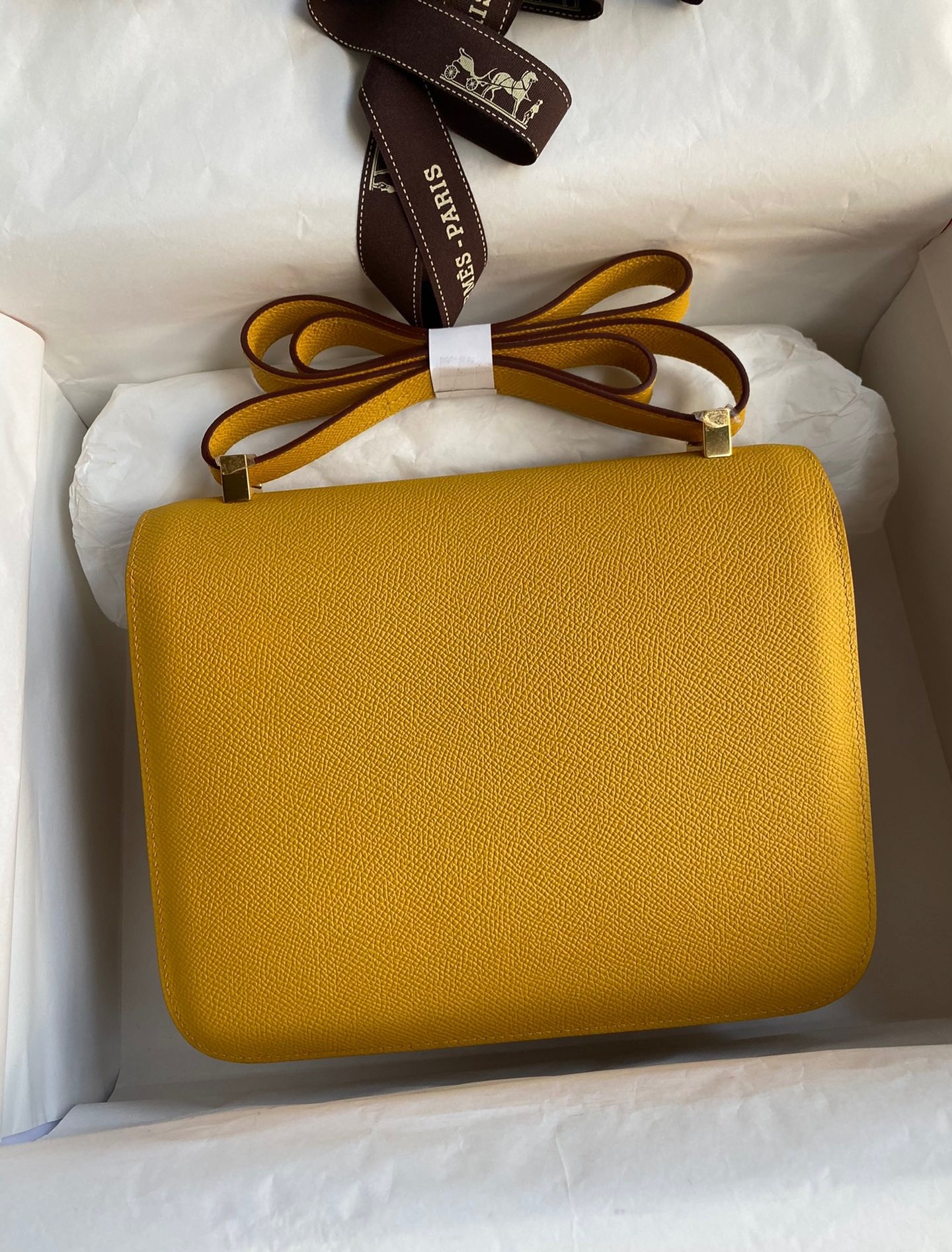 H**mes constance 24 handmade bag in jaune ambre epsom calfskin