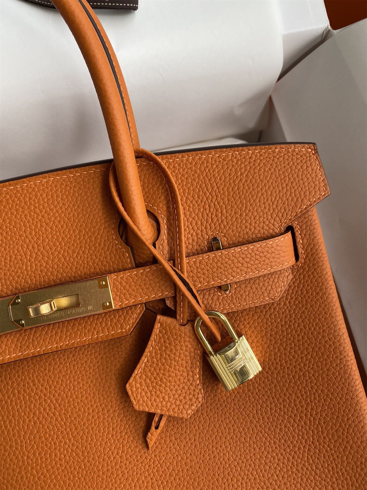 H**mes birkin 25 retourne handmade bag in orange clemence leather