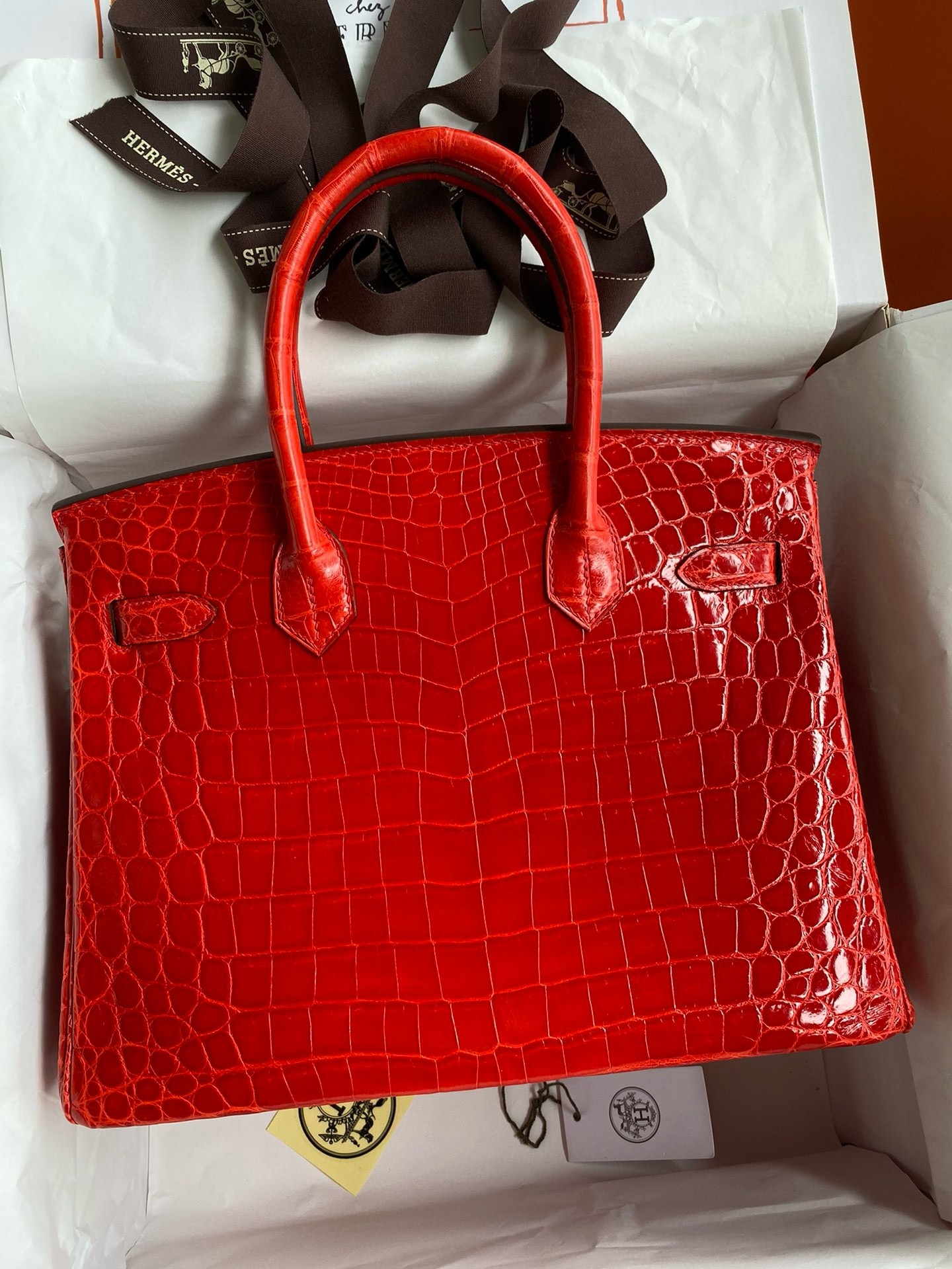 H**mes birkin 25 handmade bag in red crocodile niloticus shiny skin