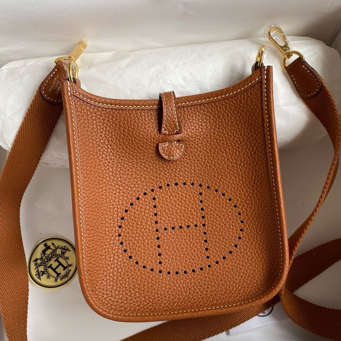 H**mes evelyne mini handmade bag in gold clemence leather