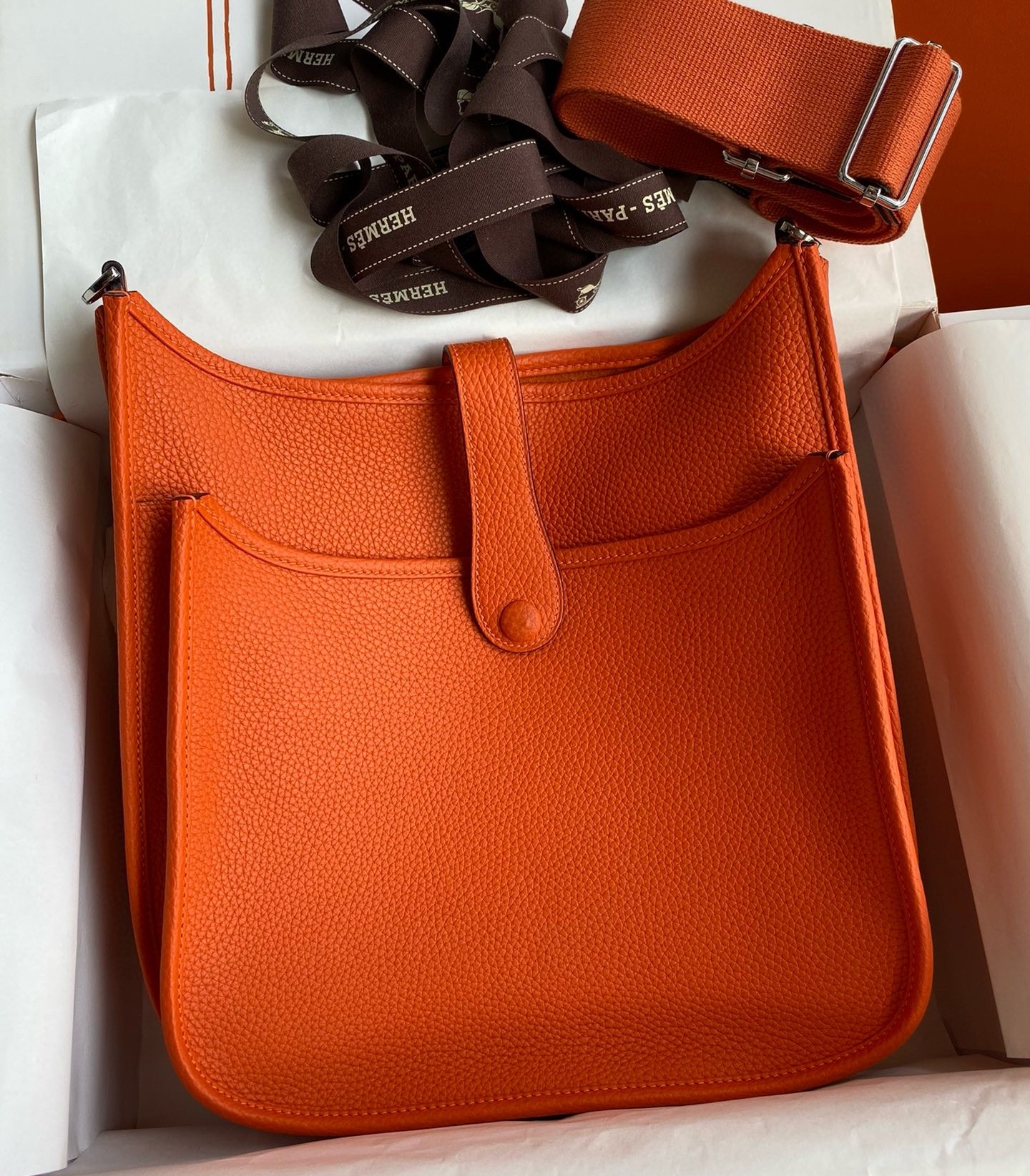 H**mes evelyne iii pm 29 handmade bag in orange clemence leather