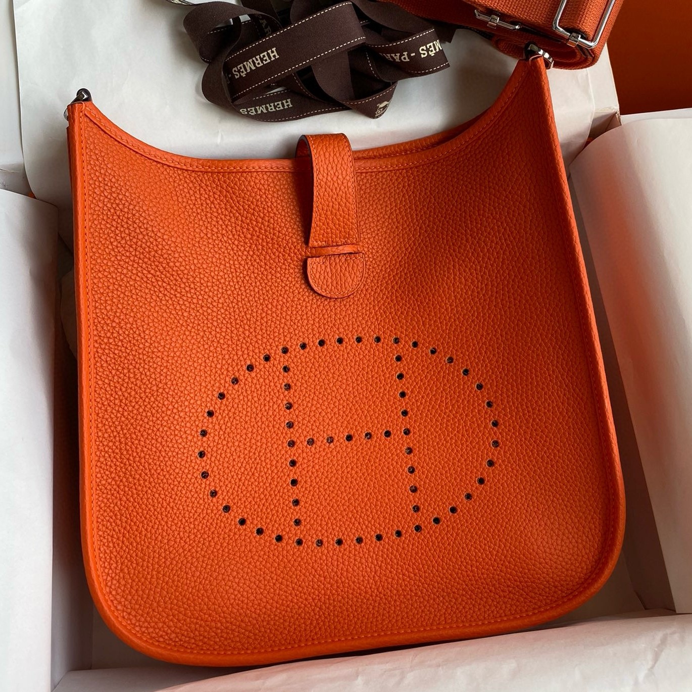 H**mes evelyne iii pm 29 handmade bag in orange clemence leather