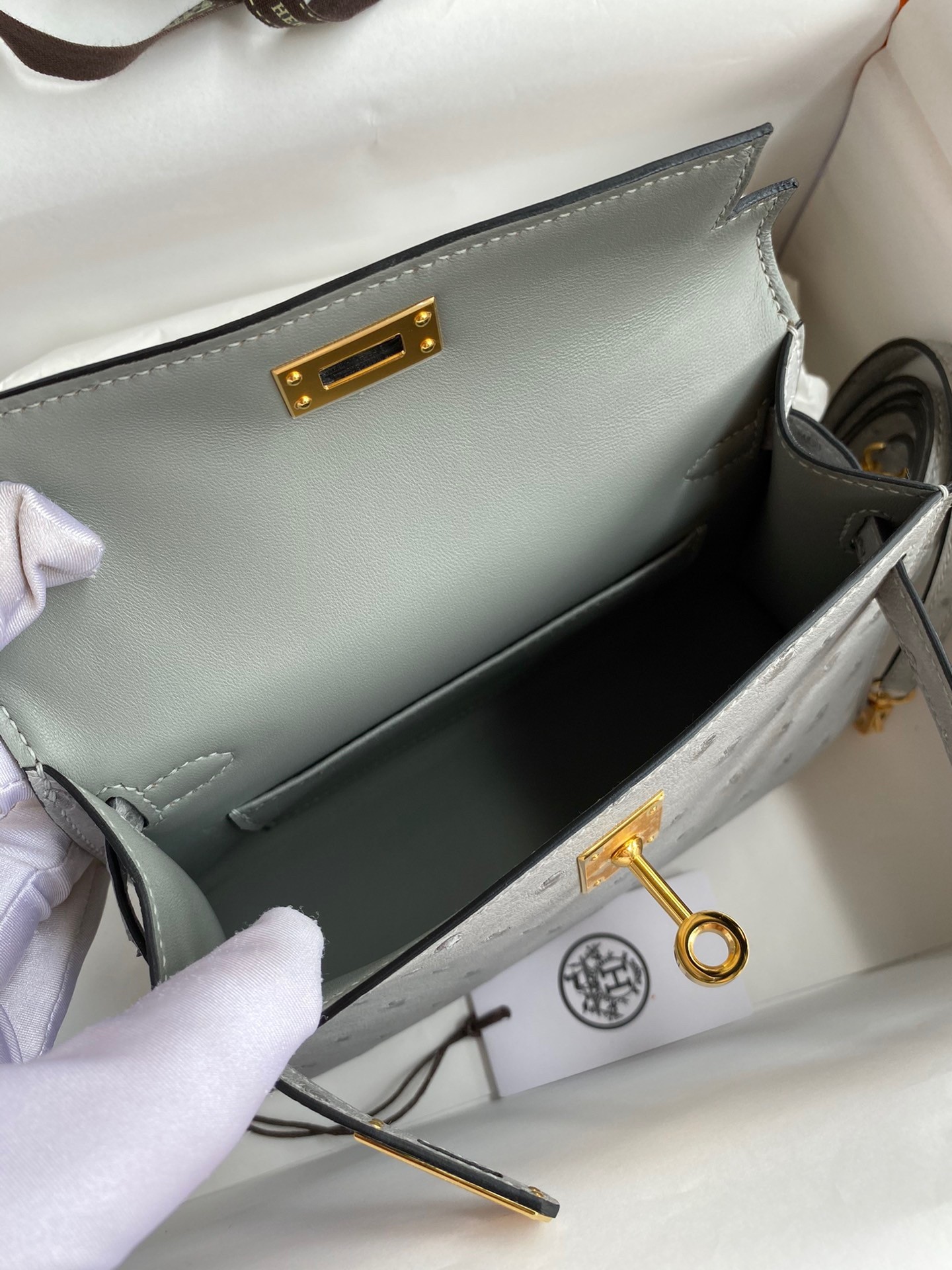 H**mes kelly mini ii sellier handmade bag in bleu glacier ostrich leather