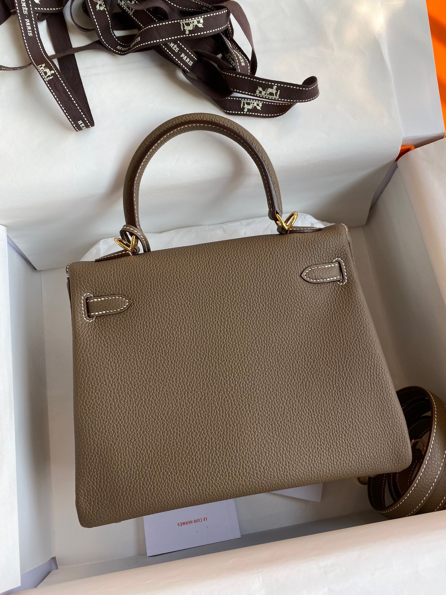 H**mes kelly retourne 25 handmade bag in taupe clemence leather