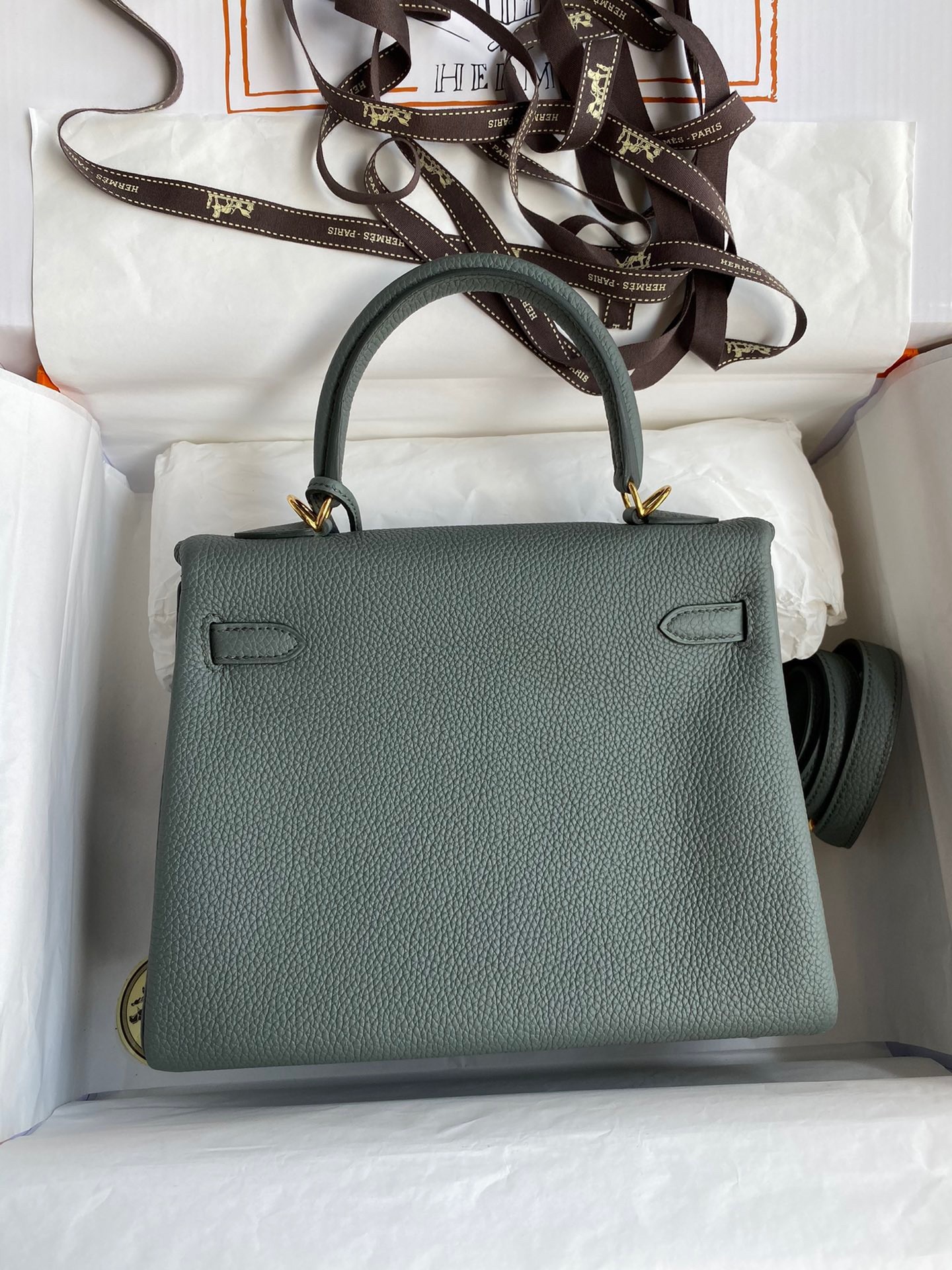 H**mes kelly retourne 25 handmade bag in vert amande clemence leather