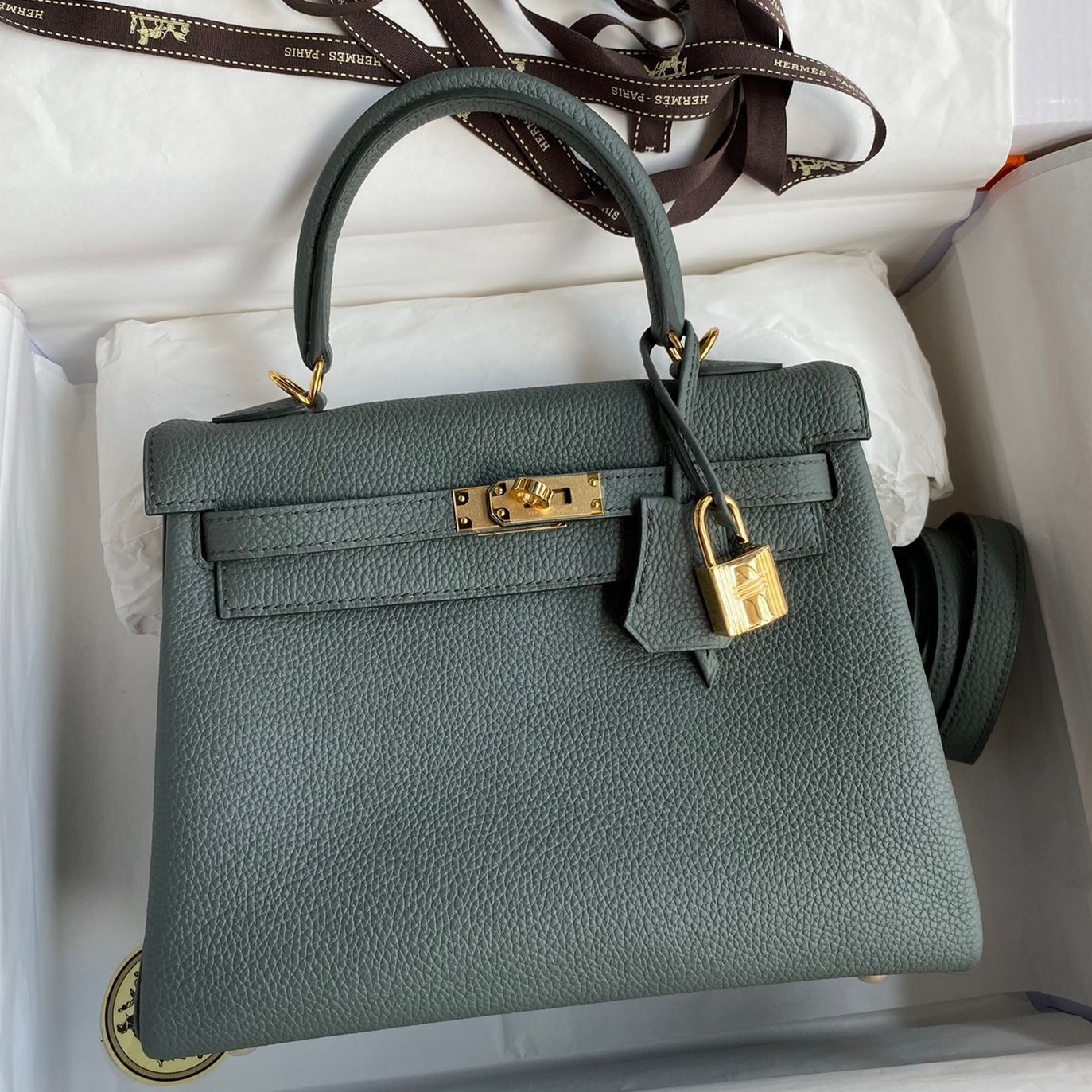 H**mes kelly retourne 25 handmade bag in vert amande clemence leather