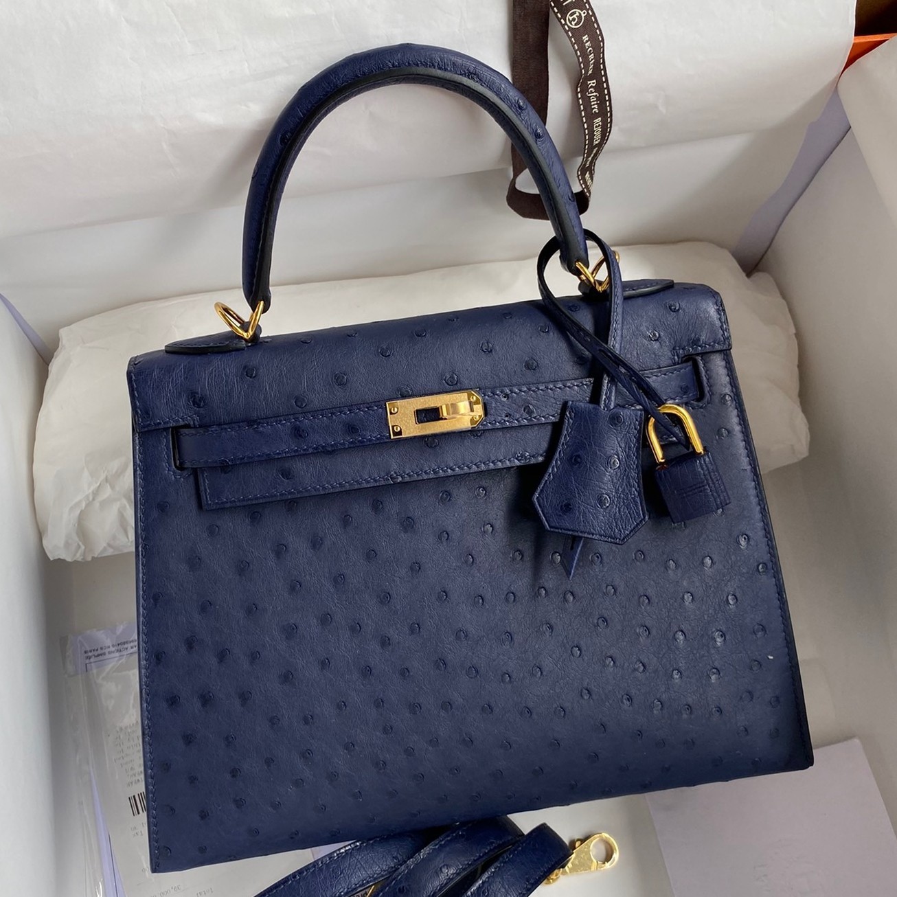 H**mes kelly sellier 25 handmade bag in blue iris ostrich leather