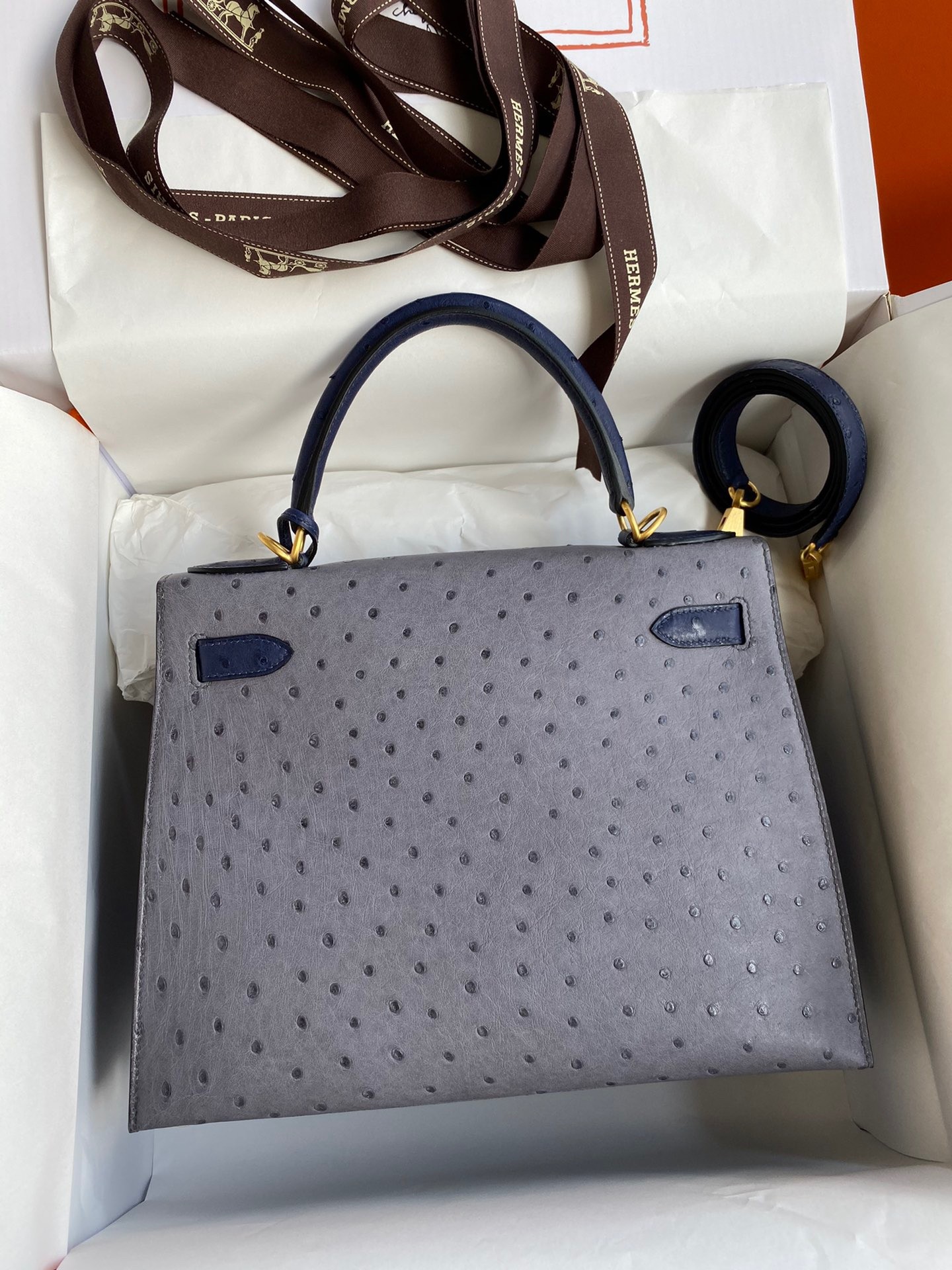H**mes kelly sellier 25 bicolor bag in gris agate and blue ostrich leather