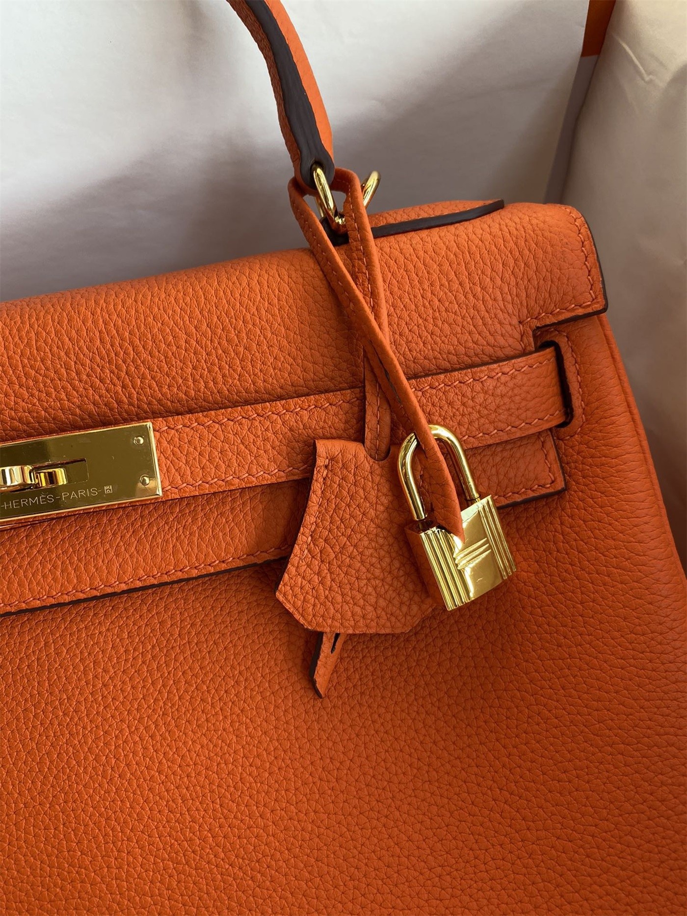 H**mes kelly retourne 32 handmade bag in orange clemence leather