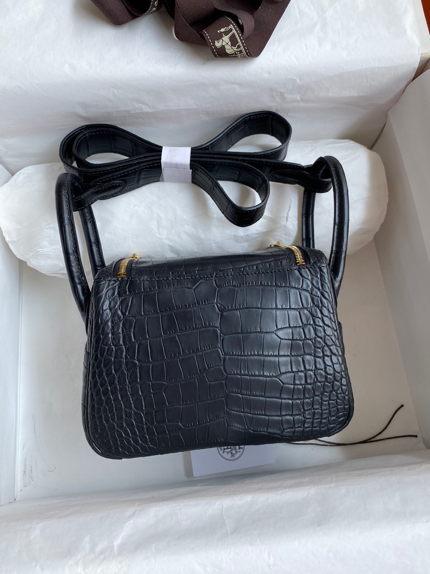H**mes mini lindy handmade bag in black matte alligator leather