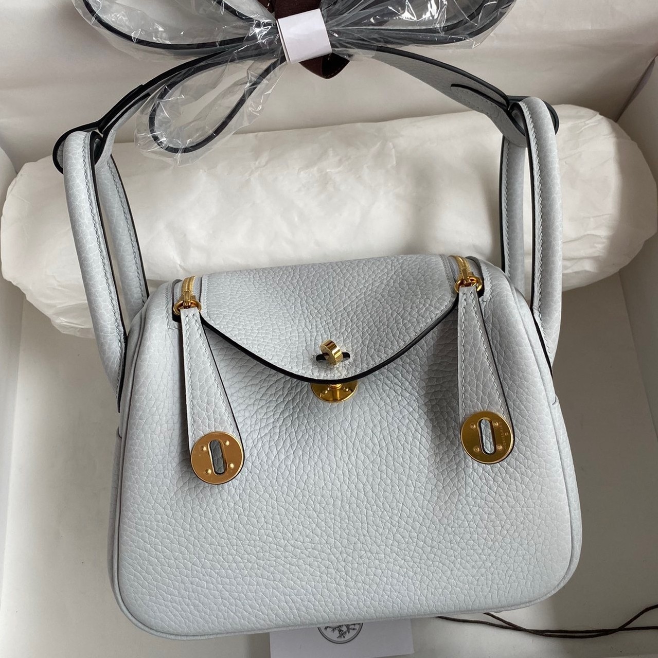 H**mes mini lindy handmade bag in blue brume clemence leather