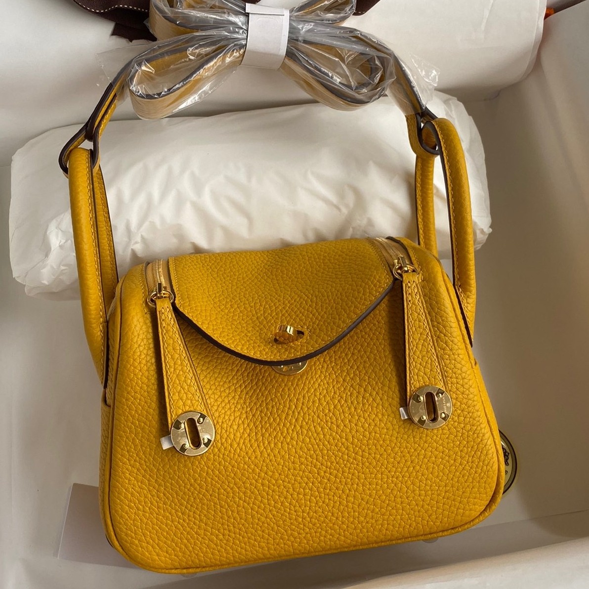 H**mes mini lindy handmade bag in jaune ambre clemence leather