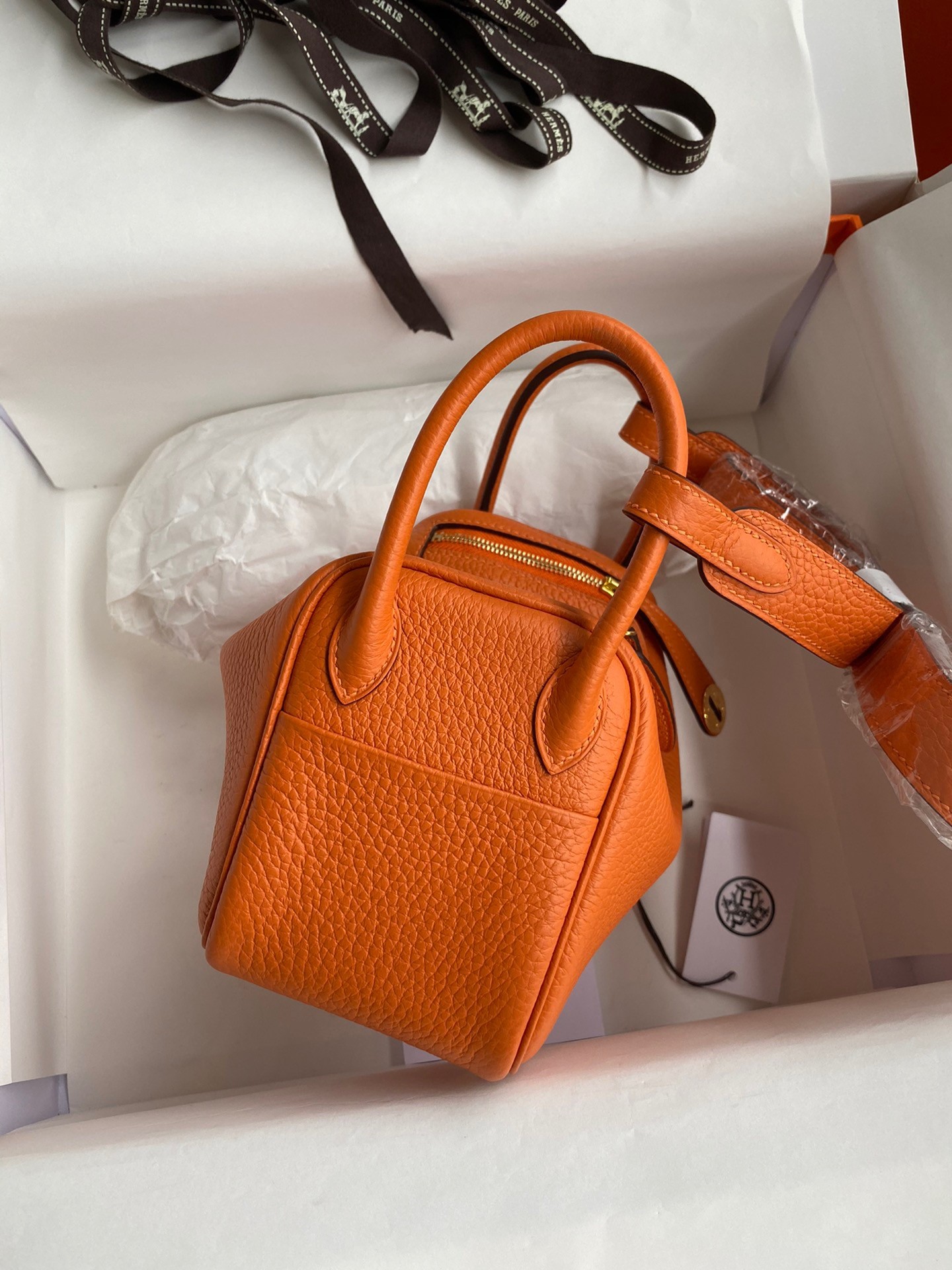 H**mes mini lindy handmade bag in orange clemence leather