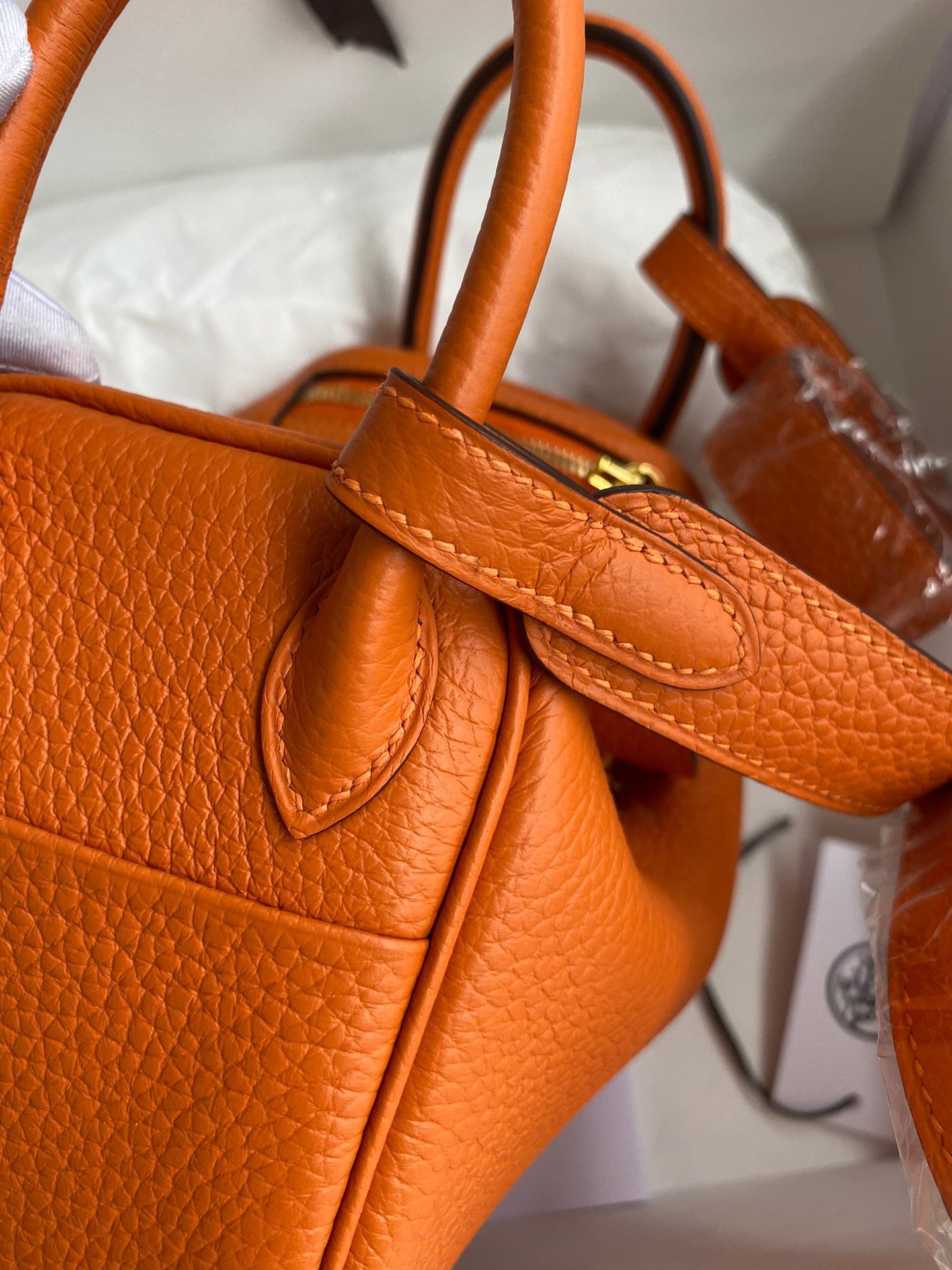 H**mes mini lindy handmade bag in orange clemence leather