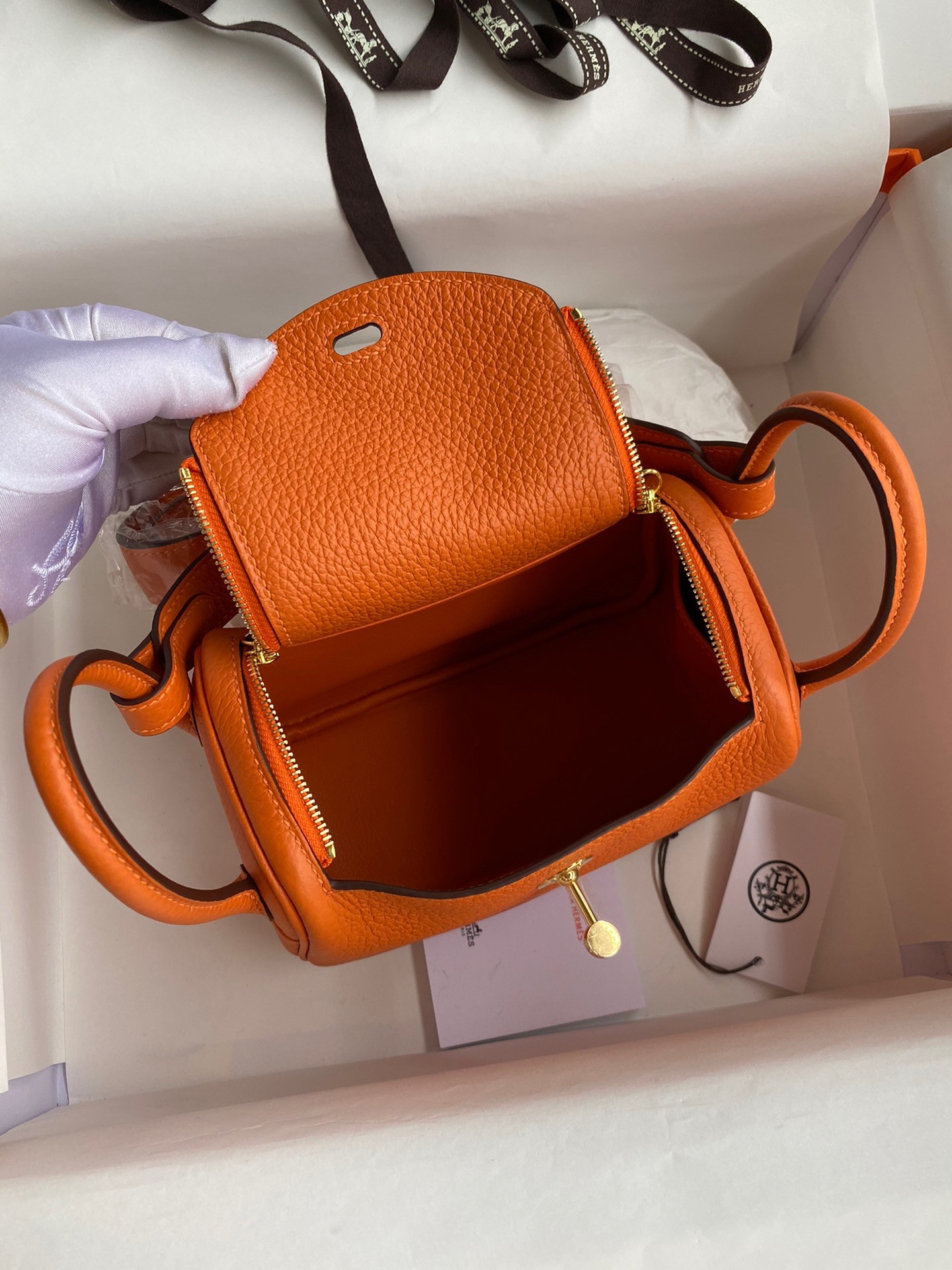 H**mes mini lindy handmade bag in orange clemence leather