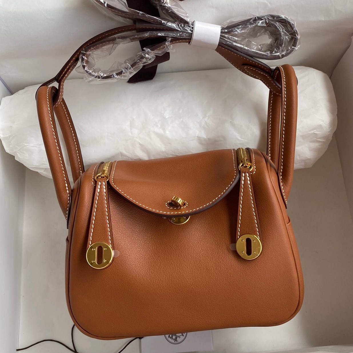 H**mes mini lindy handmade bag in gold swift leather