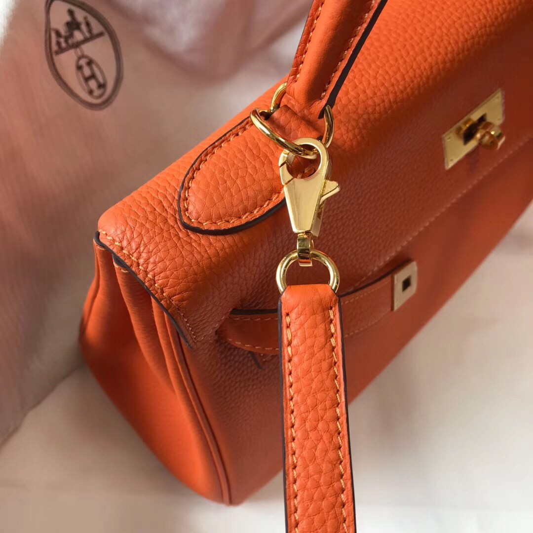 H**mes kelly 28cm retourne bag in orange clemence leather