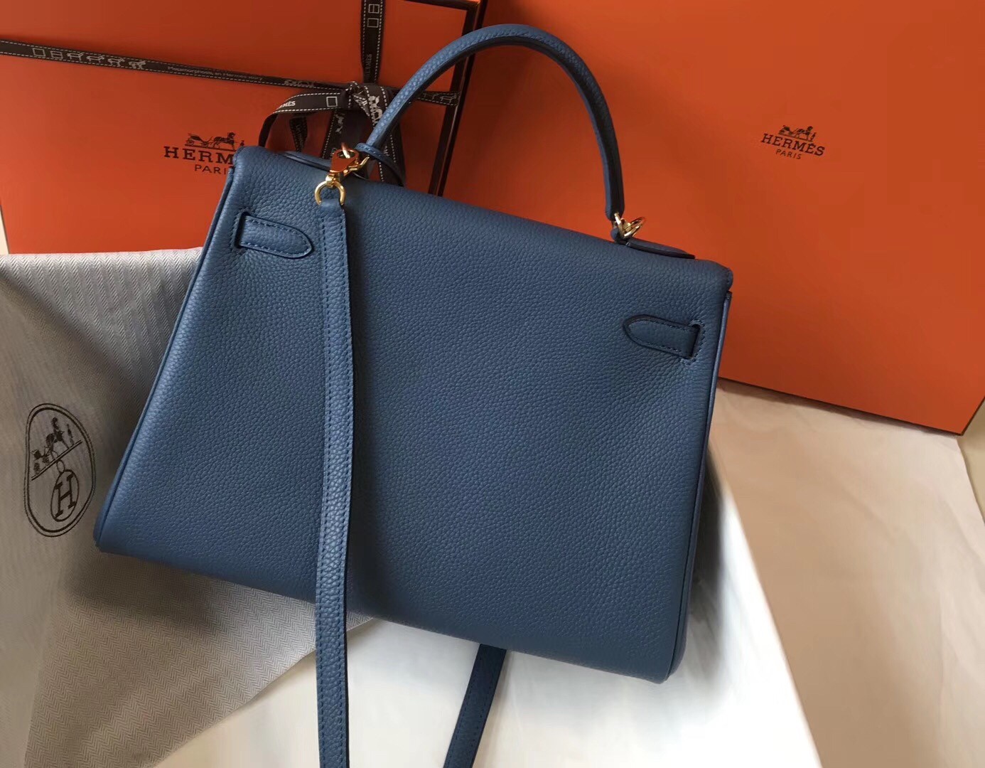 H**mes kelly 32cm retourne bag in blue agate clemence leather