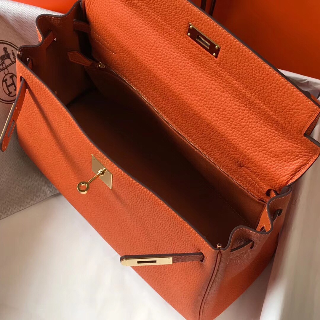H**mes kelly 32cm retourne bag in orange clemence leather