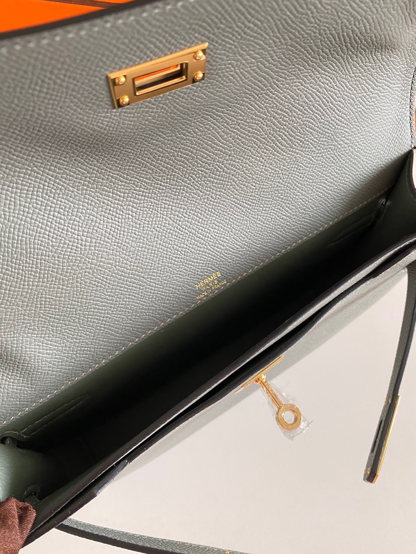 H**mes kelly depeches 25 pouch in vert amande epsom calfskin