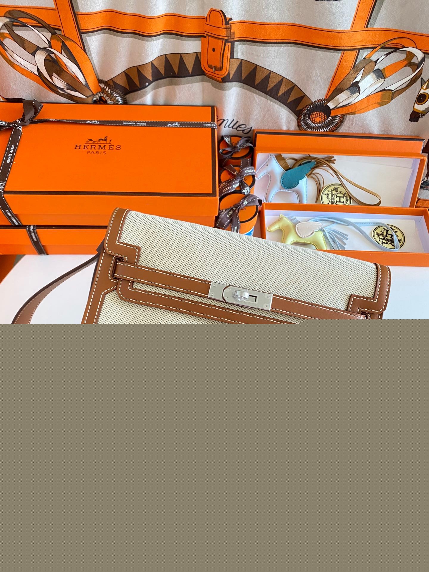 H**mes kelly depeches 25 pouch in ecru toile