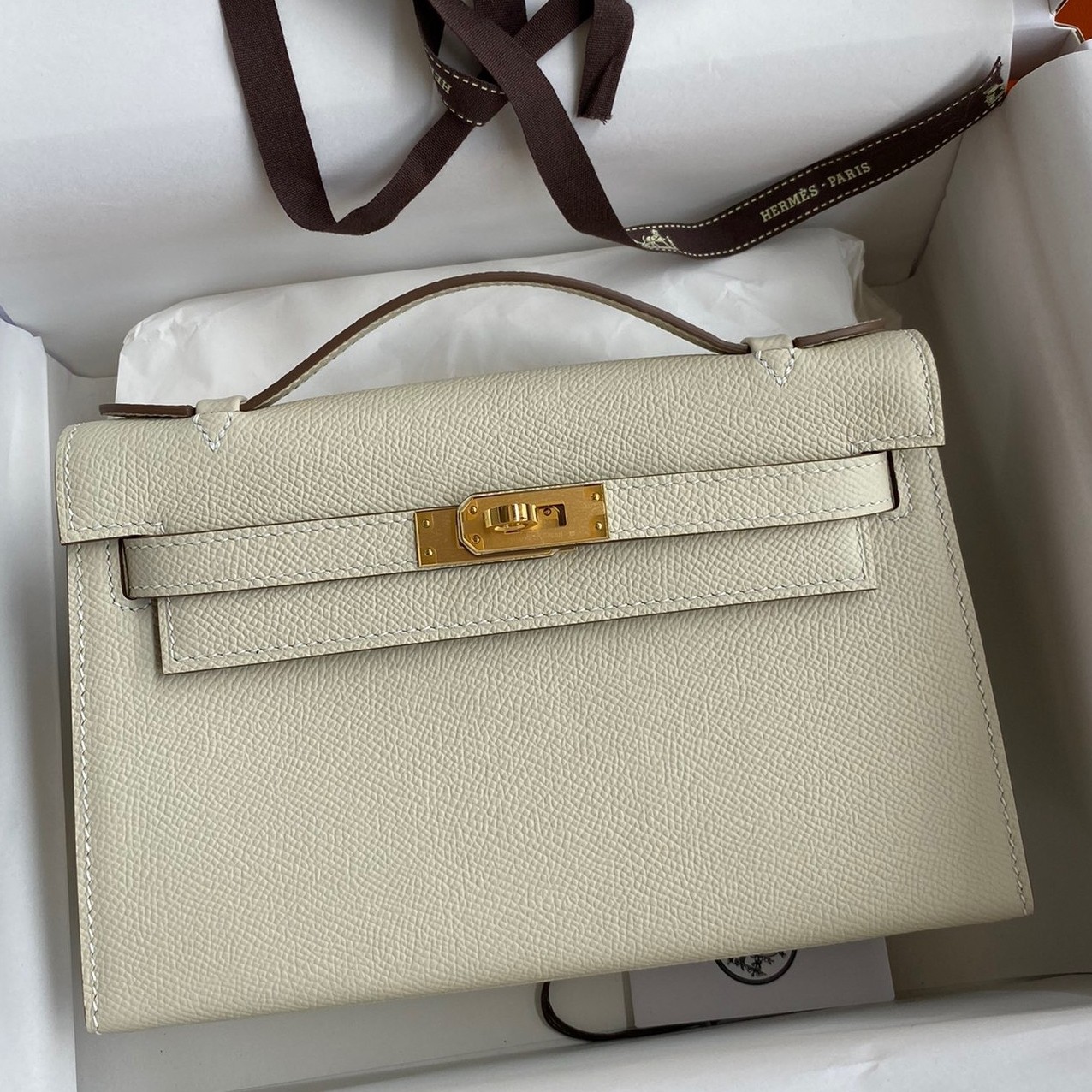 H**mes kelly pochette handmade bag in craie epsom calfskin