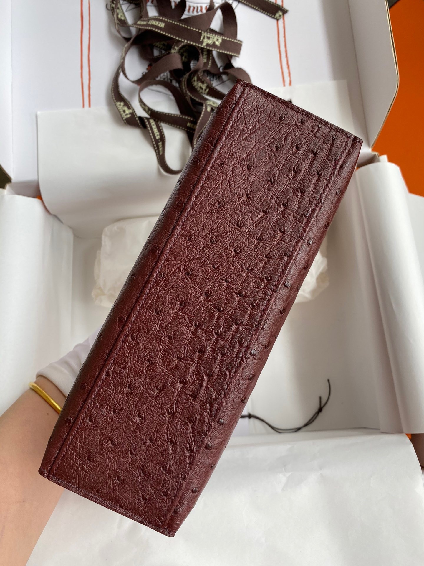 H**mes kelly pochette handmade bag in bordeaux ostrich leather