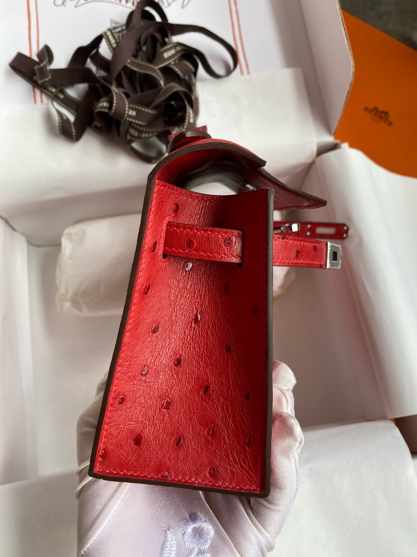 H**mes kelly pochette handmade bag in red ostrich leather