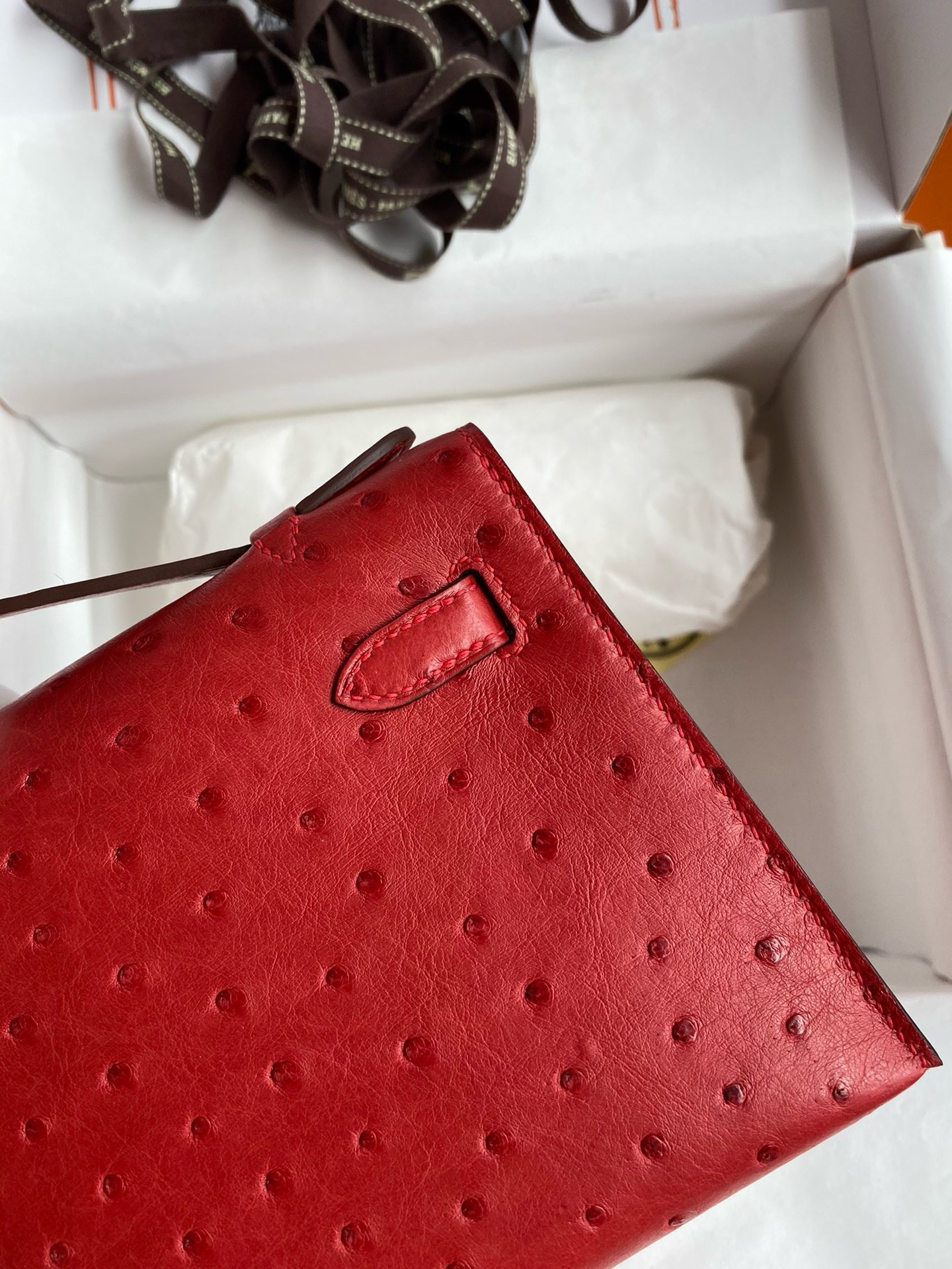H**mes kelly pochette handmade bag in red ostrich leather