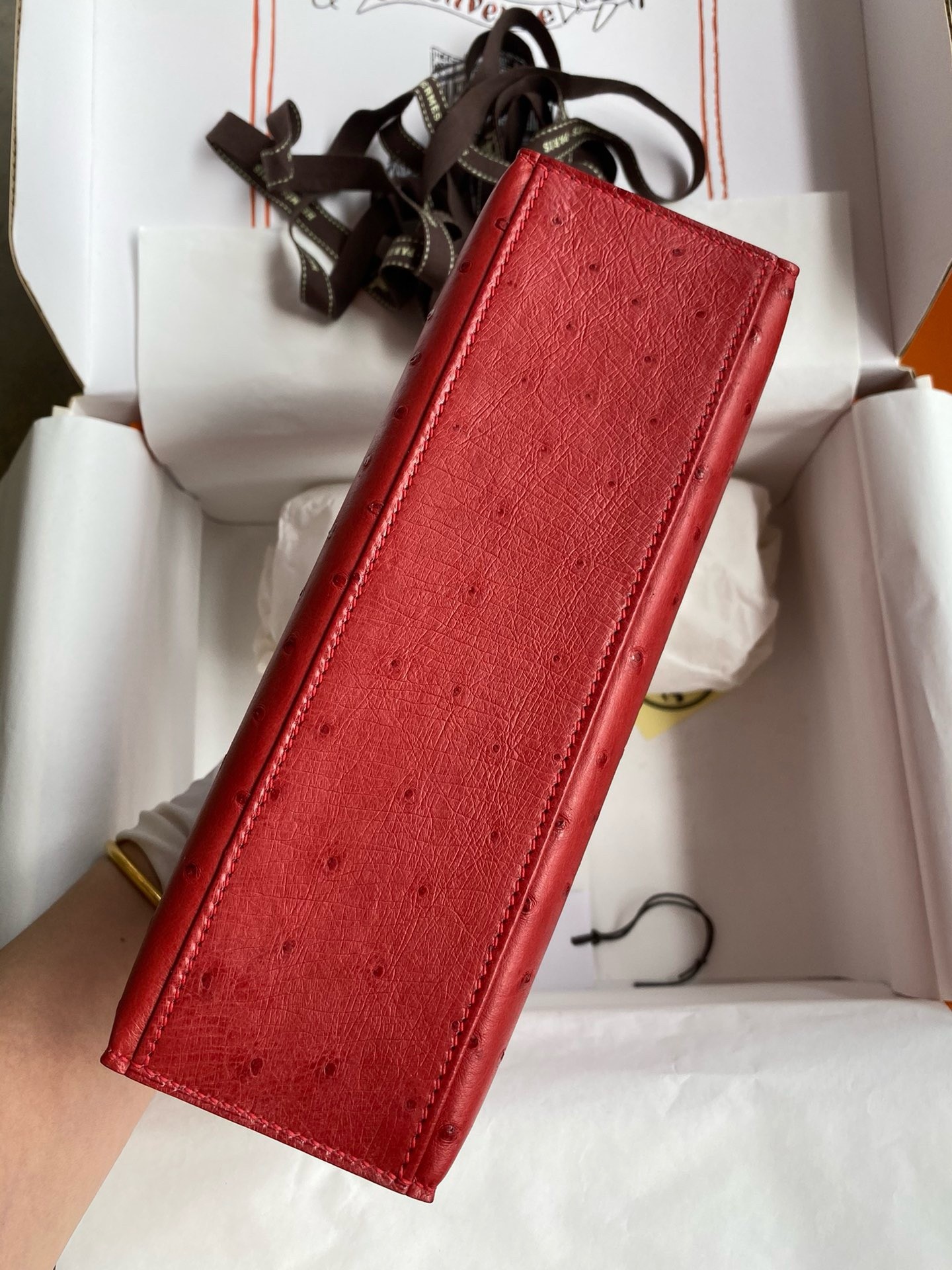 H**mes kelly pochette handmade bag in red ostrich leather