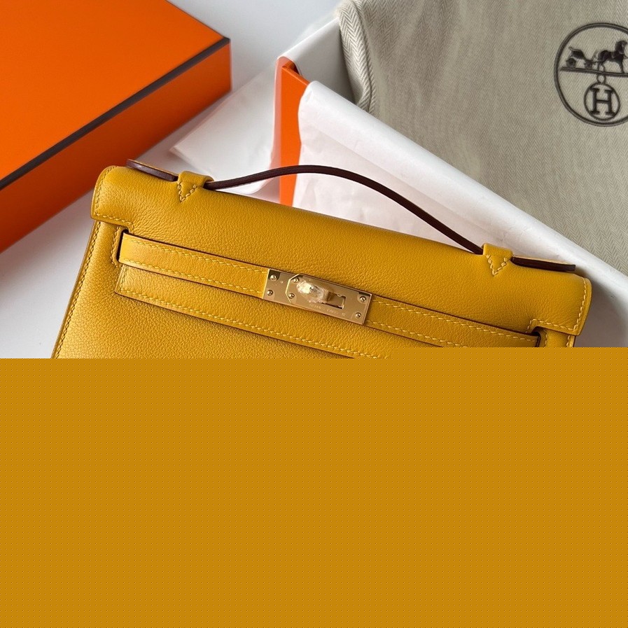 H**mes kelly pochette handmade bag in jaune ambre swift calfskin