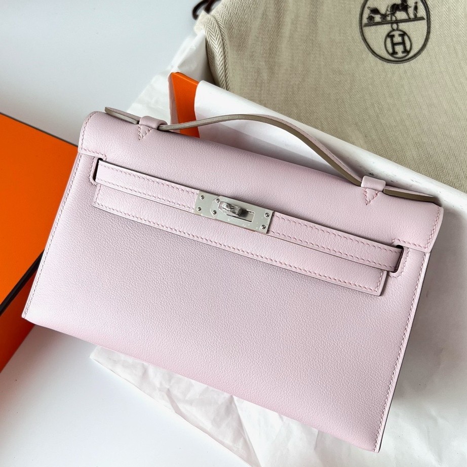 H**mes kelly pochette handmade bag in mauve pale swift calfskin