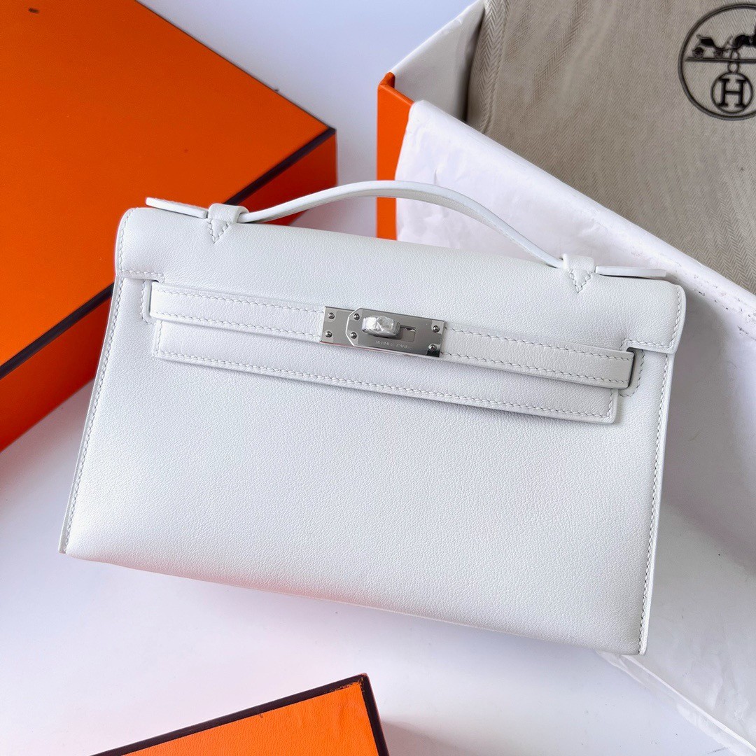 H**mes kelly pochette handmade bag in white swift calfskin