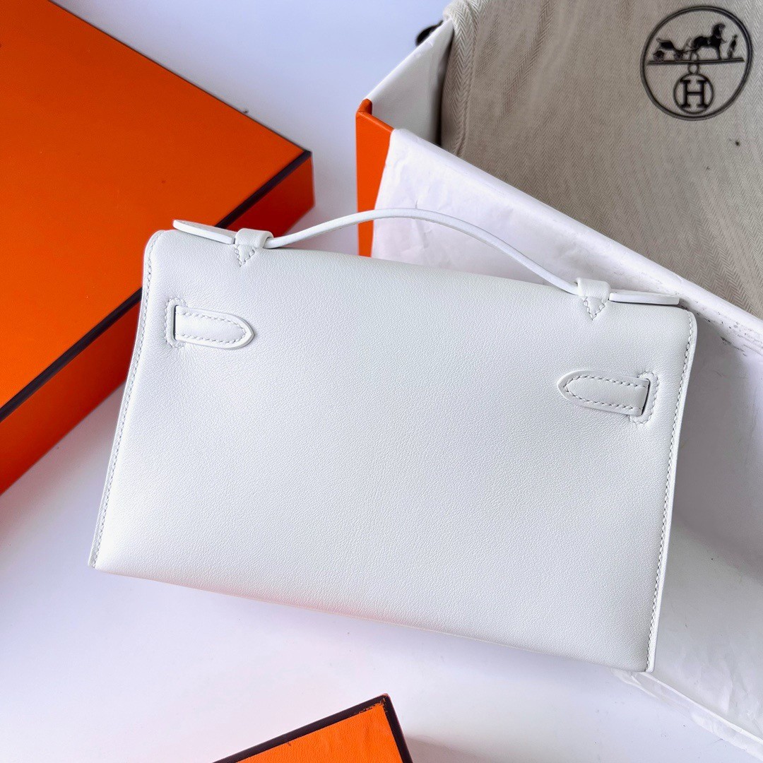 H**mes kelly pochette handmade bag in white swift calfskin