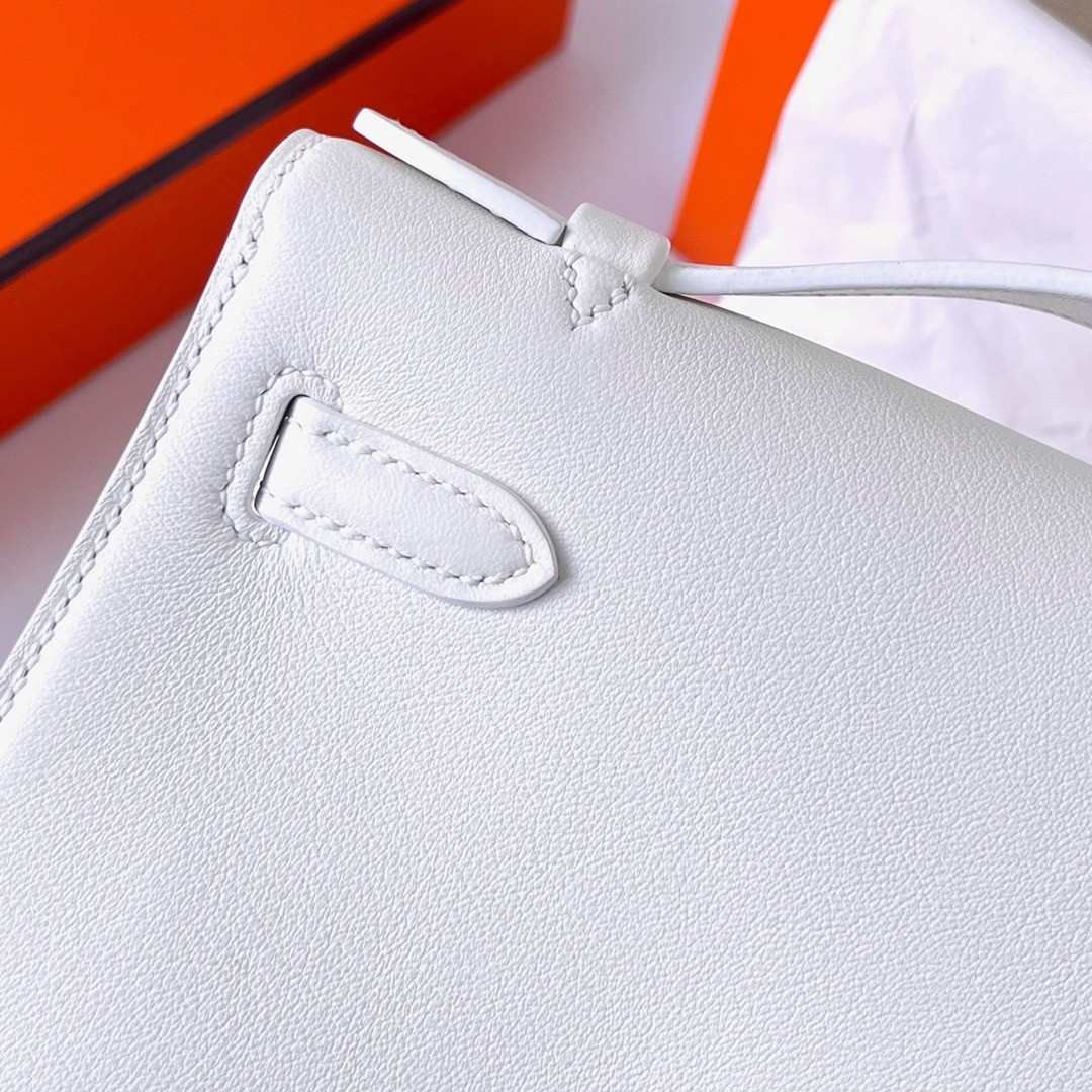 H**mes kelly pochette handmade bag in white swift calfskin