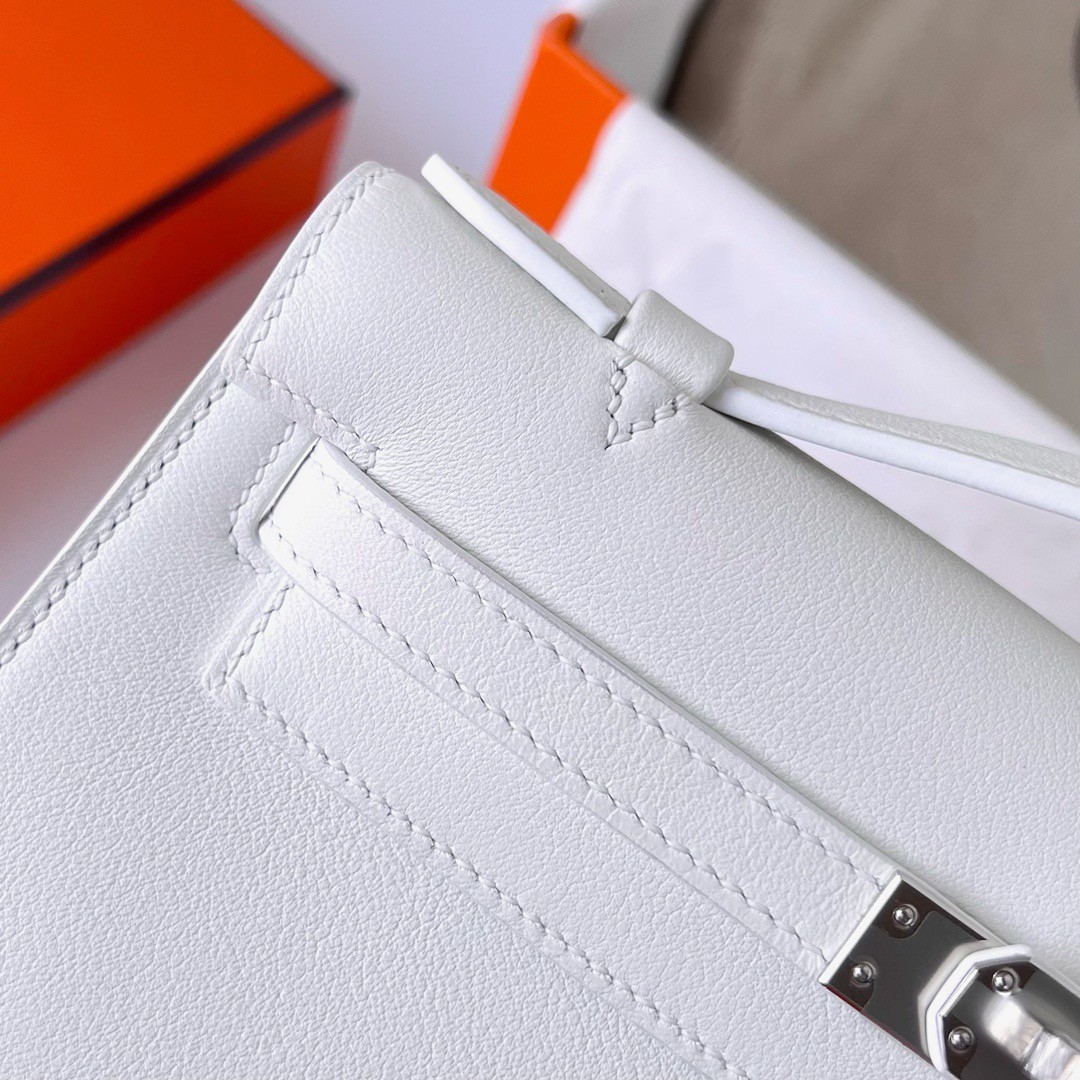H**mes kelly pochette handmade bag in white swift calfskin