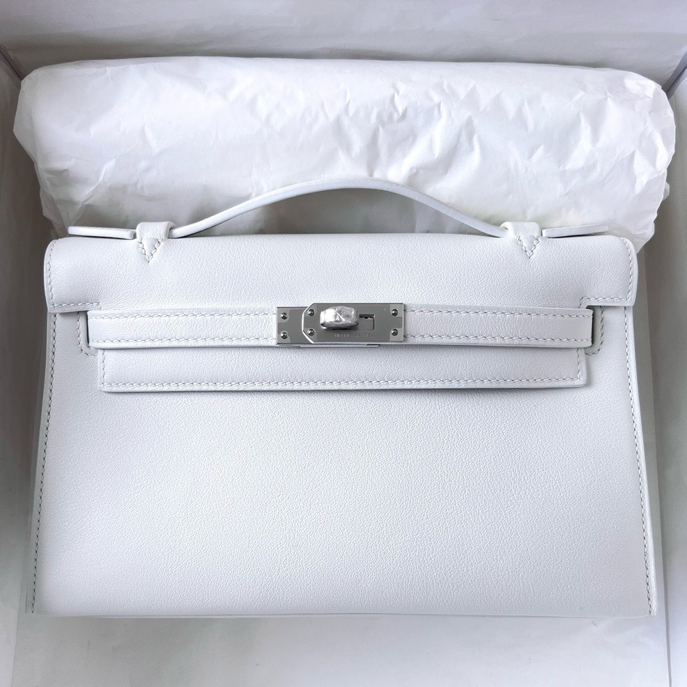 H**mes kelly pochette handmade bag in white swift calfskin